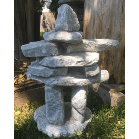Cement Inukshuk garden sculpture